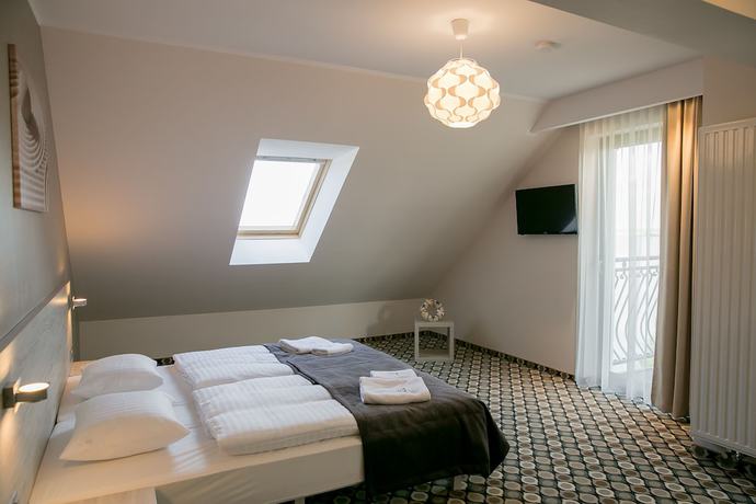 Imagen de la habitación del Hotel Marina Mielno z widokiem na Jezioro. Foto 3