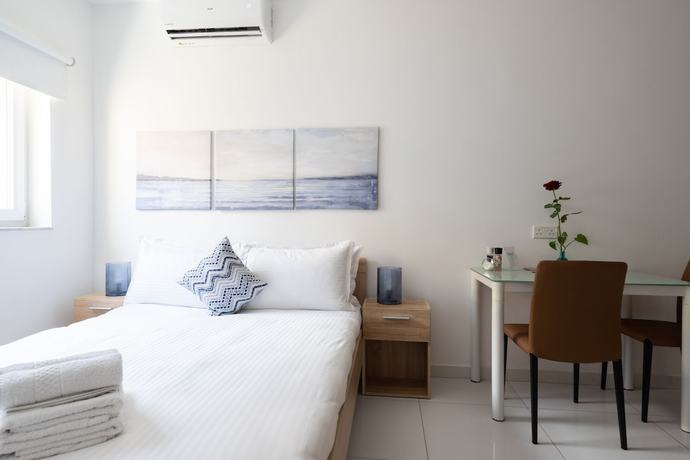 Imagen de la habitación del Hotel Marina Studios. Foto 11