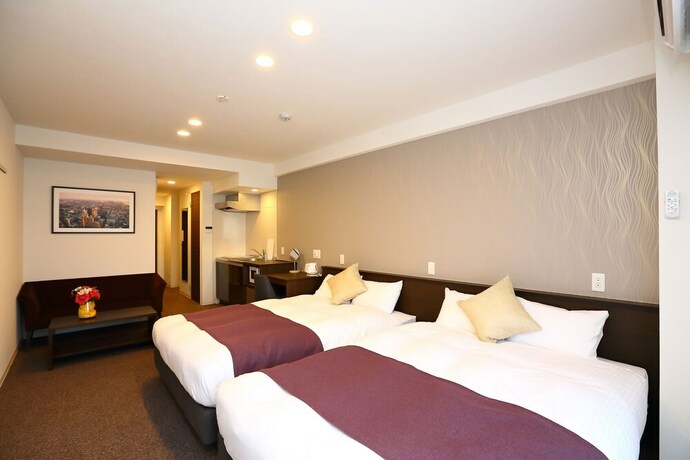 Imagen de la habitación del Hotel Marina Sunrise Osaka Bay. Foto 15