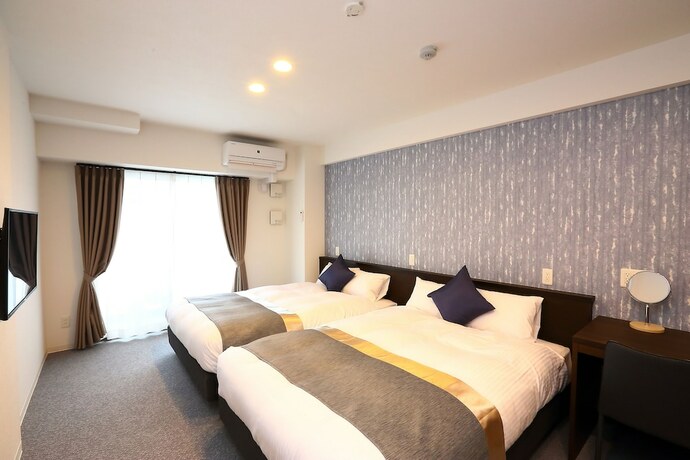 Imagen de la habitación del Hotel Marina Sunrise Osaka Bay. Foto 19