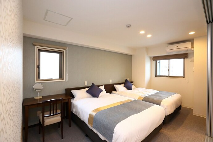 Imagen de la habitación del Hotel Marina Sunrise Osaka Bay. Foto 23