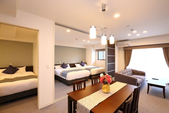 Imagen de la habitación del Hotel Marina Sunrise Osaka Bay. Foto 25