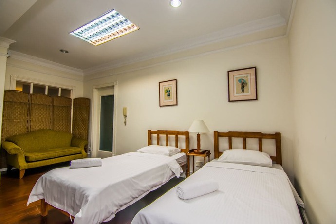 Imagen de la habitación del Hotel Marina Travellers Suite Marina Court. Foto 11