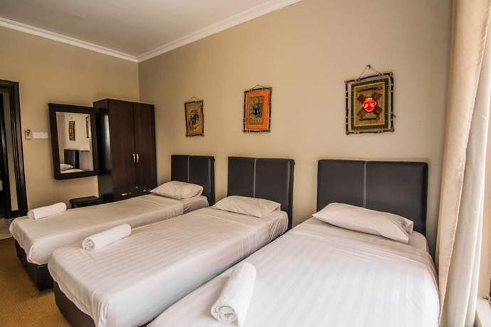 Imagen de la habitación del Hotel Marina Travellers Suite Marina Court. Foto 14