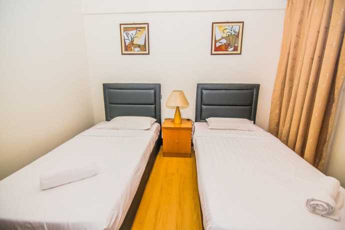 Imagen de la habitación del Hotel Marina Travellers Suite Marina Court. Foto 15