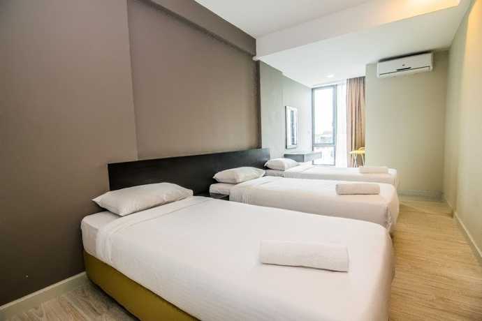 Imagen de los interiores del Hotel Marina Travellers Suite SKY Karamunsing. Foto 18