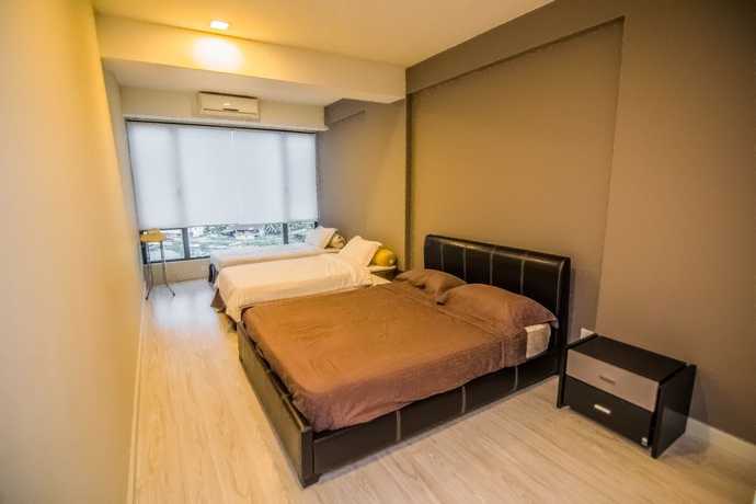 Imagen de la habitación del Hotel Marina Travellers Suite SKY Karamunsing. Foto 7