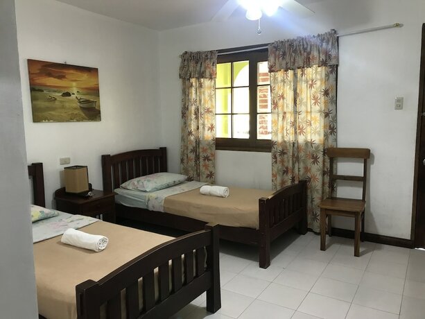 Imagen de la habitación del Hotel Marina Village Resort Moalboal. Foto 2