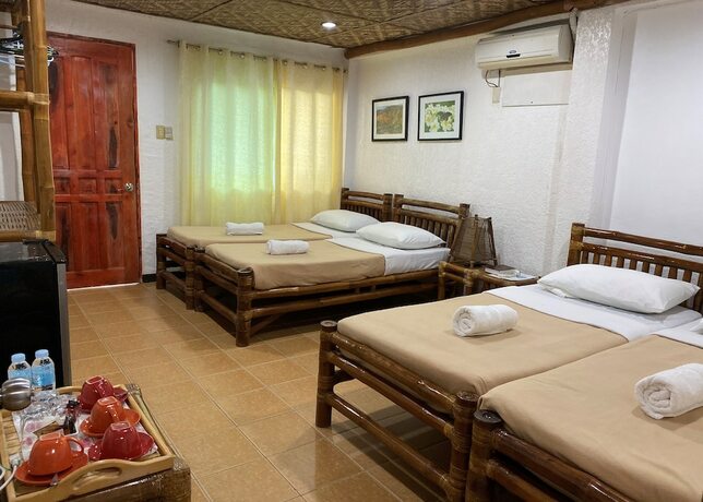 Imagen de la habitación del Hotel Marina Village Resort Moalboal. Foto 5