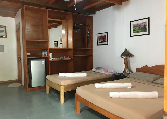 Imagen de la habitación del Hotel Marina Village Resort Moalboal. Foto 6