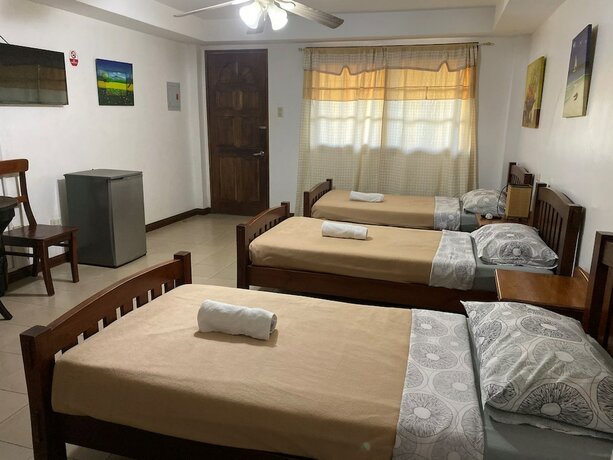 Imagen de la habitación del Hotel Marina Village Resort Moalboal. Foto 9