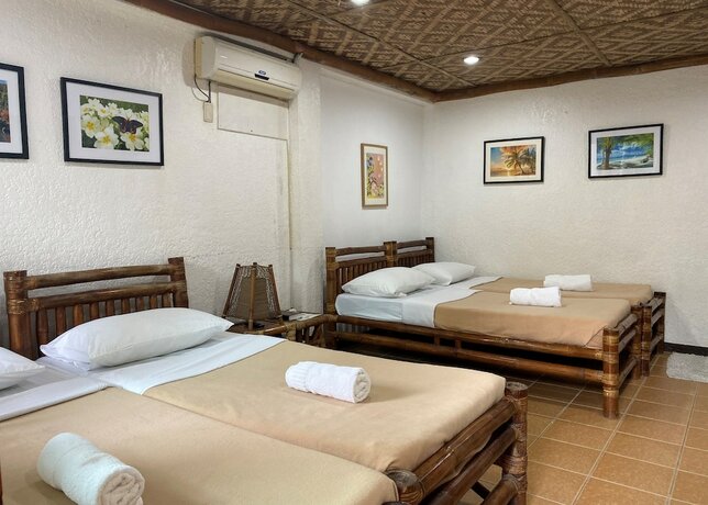 Imagen de la habitación del Hotel Marina Village Resort Moalboal. Foto 10