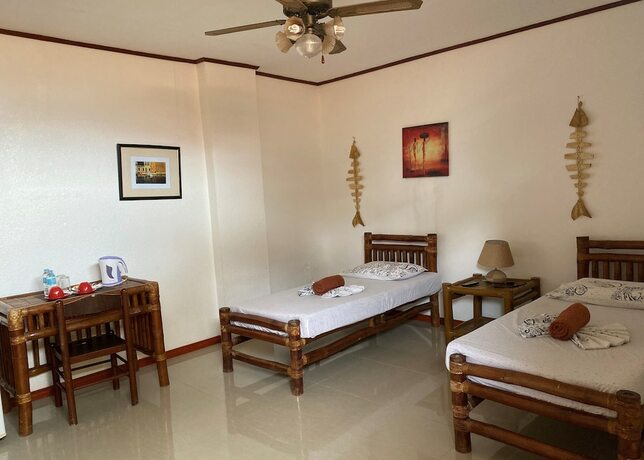 Imagen de la habitación del Hotel Marina Village Resort Moalboal. Foto 14