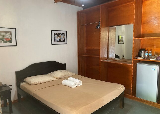 Imagen de la habitación del Hotel Marina Village Resort Moalboal. Foto 15
