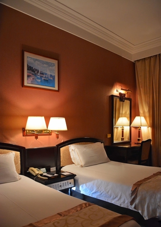 Imagen de la habitación del Hotel Marine Garden. Foto 16