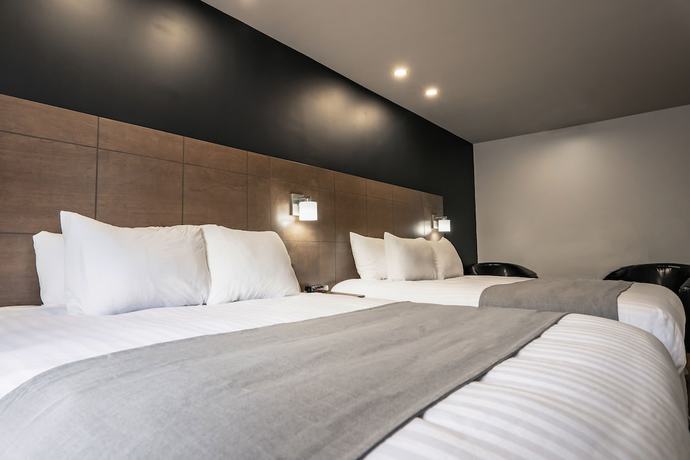 Imagen de la habitación del Hotel Marineau La Tuque. Foto 11