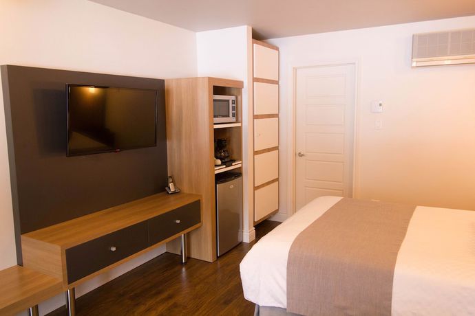 Imagen de la habitación del Hotel Marineau La Tuque. Foto 13