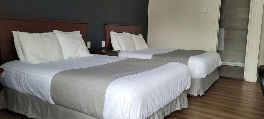 Imagen de la habitación del Hotel Marineau La Tuque. Foto 17