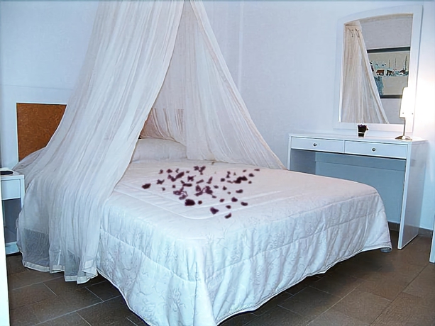 Imagen de la habitación del Hotel Marinero and Suites. Foto 4