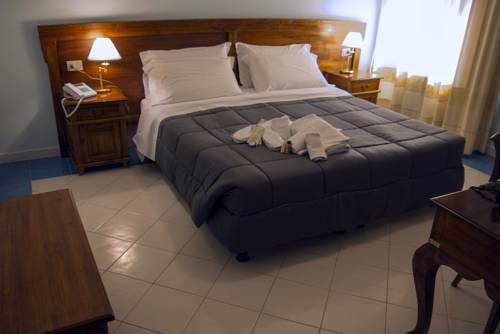 Imagen de la habitación del Hotel Marini. Foto 6