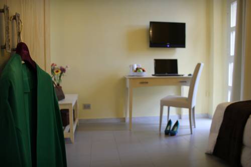 Imagen de la habitación del Hotel Marini. Foto 7