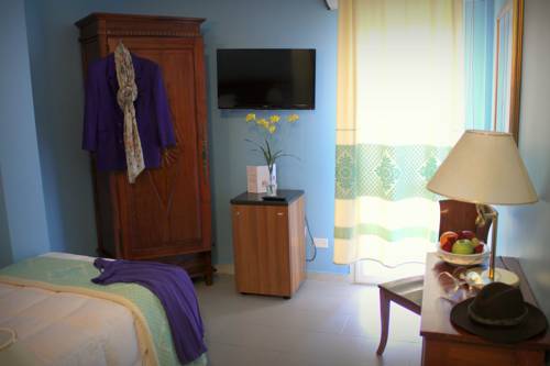Imagen de la habitación del Hotel Marini. Foto 8