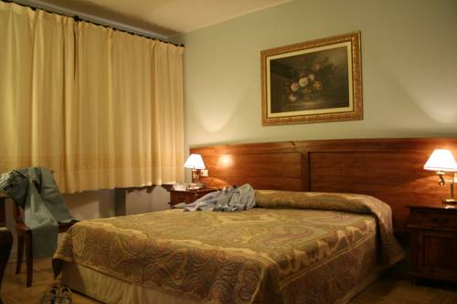 Imagen de la habitación del Hotel Marini. Foto 15