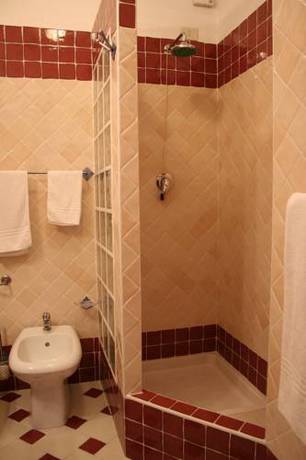 Imagen de la habitación del Hotel Marini. Foto 16