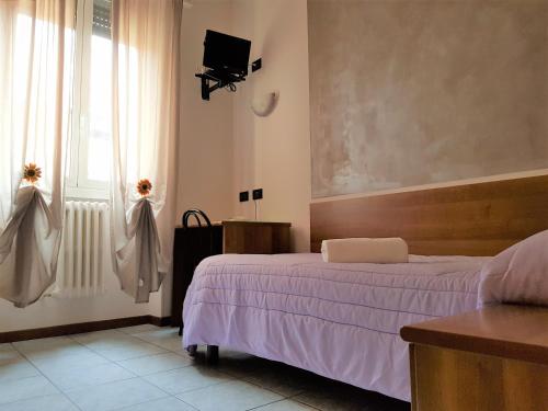 Imagen de la habitación del Hotel Marinoni. Foto 5