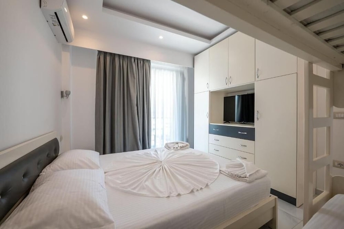 Imagen de la habitación del Hotel Mario Apartments. Foto 11