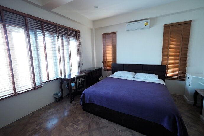 Imagen de la habitación del Hotel Marisa Villa. Foto 28