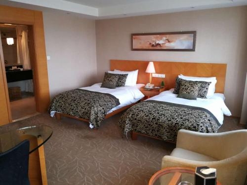 Imagen de la habitación del Hotel Maritim Taicang Garden. Foto 8