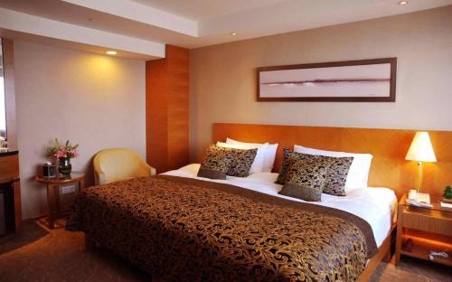 Imagen de la habitación del Hotel Maritim Taicang Garden. Foto 9