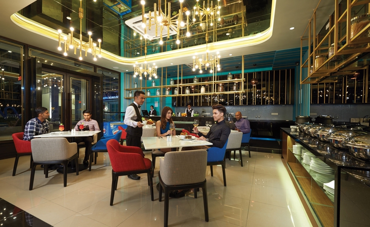 Imagen del bar/restaurante del Hotel Maritime Luxury Suites. Foto 2