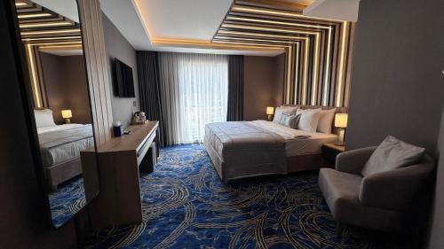 Imagen de la habitación del Hotel Maritimo, Ortahisar. Foto 13