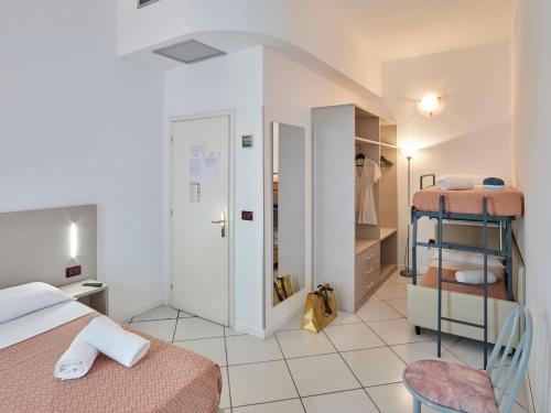 Imagen de la habitación del Hotel Marittima Rooms. Foto 17