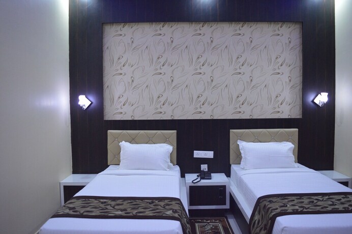 Imagen de la habitación del Hotel Mariya International. Foto 16