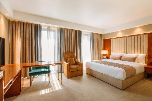 Imagen de la habitación del Hotel Marjan Plaza. Foto 15