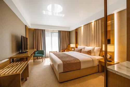 Imagen de la habitación del Hotel Marjan Plaza. Foto 18