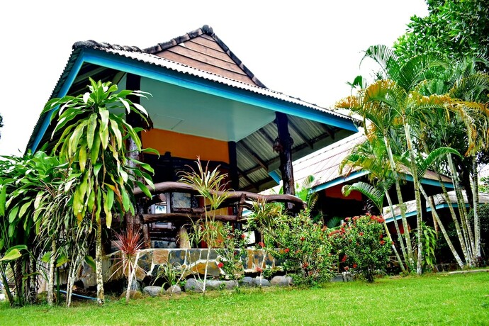 Imagen de la habitación del Hotel Mark House Bungalow. Foto 15