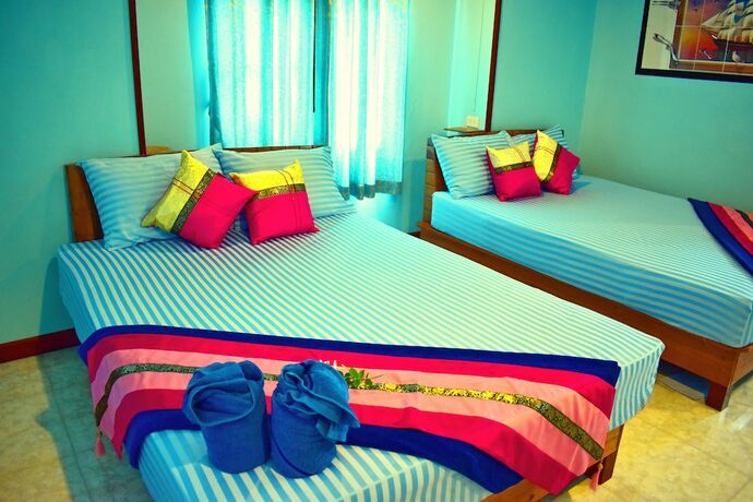 Imagen de la habitación del Hotel Mark House Bungalow. Foto 18