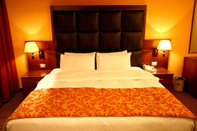 Imagen de la habitación del Hotel Markazia Suites. Foto 7