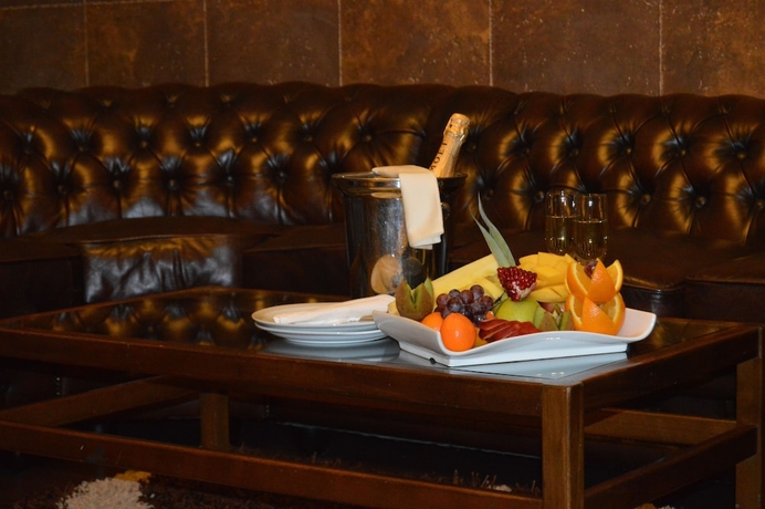 Imagen de la habitación del Hotel Markazia Suites. Foto 9
