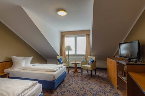 Imagen de la habitación del Hotel Markkleeberger Hof. Foto 7