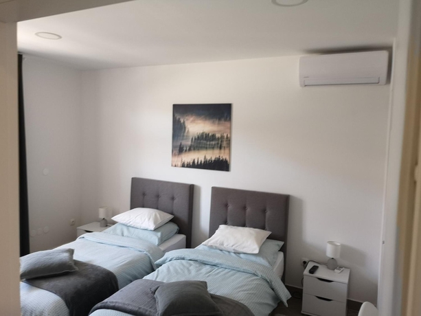 Imagen de la habitación del Hotel Marko Airport Rooms. Foto 11