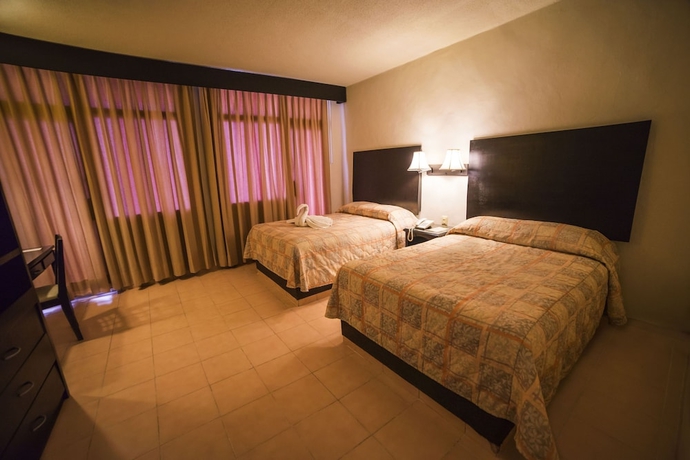Imagen de la habitación del Hotel Marlon. Foto 11