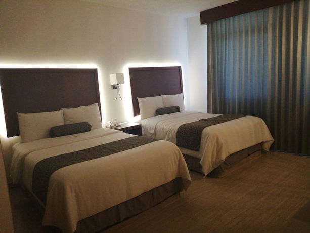 Imagen de la habitación del Hotel Marlon. Foto 14