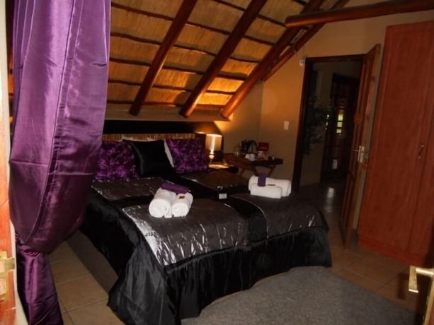 Imagen de la habitación del Hotel Marloth Kruger Accommodation. Foto 18