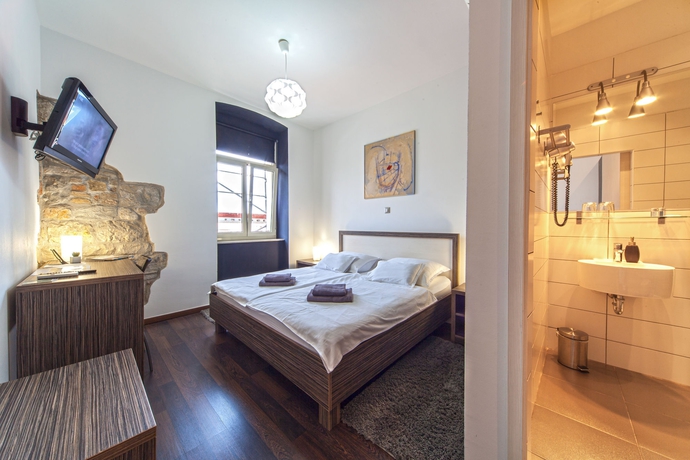 Imagen de la habitación del Hotel Marmontova Luxury Rooms. Foto 6