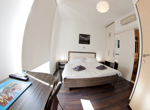 Imagen de la habitación del Hotel Marmontova Luxury Rooms. Foto 12